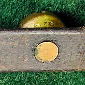 Sleigh bell with rivet fastener